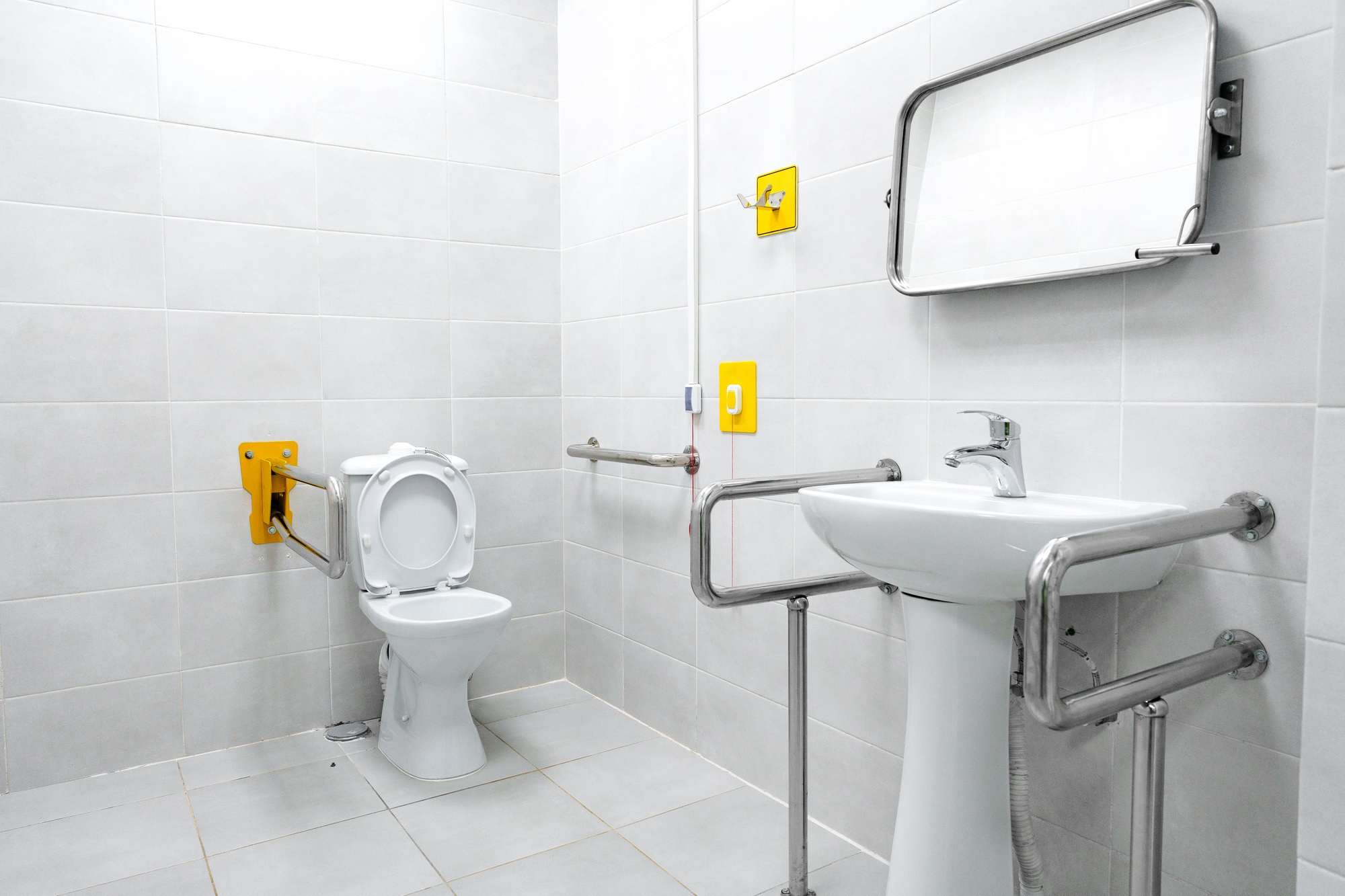 Accessible bathroom designed for ease of use with safety features and modern fixtures